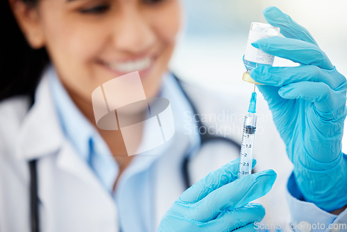 Image of Doctor or medical worker with covid vaccine injection at hospital or laboratory close up. Hands of healthcare woman with medicine and shot to help with health, wellness and immunity booster