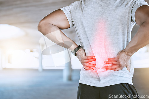 Image of Sports man with back pain or injury after a fitness workout or exercise training outdoor. Runner with hurt muscle after cardio fitness routine with red graphic highlight on the body or injured joint