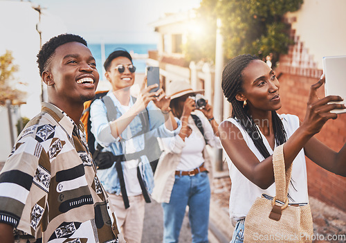 Image of Travel people doing cellphone photography of architecture abroad in a foreign city street. Men and women influencer or tourists making memories on phone of summer vacation for online social media app