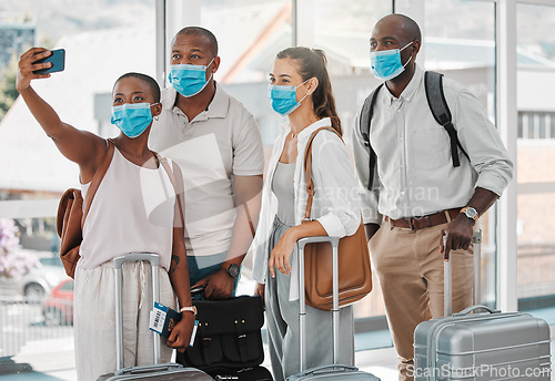 Image of Travel people taking selfie with covid face mask at the airport on their trip, travel or holiday overseas. Group of people or friends with suitcase, phone and social media memories while on vacation