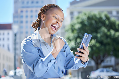 Image of Happy, excited and celebrating while reading on phone and woman feeling like a winner while cheering for investment or banking app message in city. Lucky entrepreneur getting good news about bonus