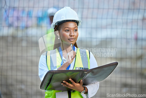 Image of Construction worker, maintenance and development woman thinking with documents at work. Building management employee with a vision for improvement or plan for contractor or builder at the job site.