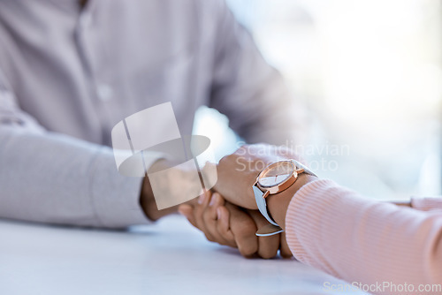 Image of Cancer, trust and support holding hands, woman showing compassion and kindness after bad news. Female comfort male health crisis after results or diagnosis. United people show affection in hard time