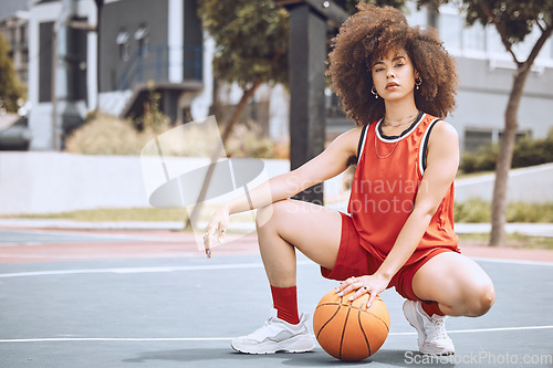 Image of Basketball court, sports and black woman with fashion living a healthy, fitness and exercise culture lifestyle. Portrait of cool, swag and afro girl with wellness, natural beauty and empowerment