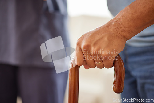 Image of Support, physiotherapy and disability patient hold walking stick or cane, practice recovery with physical therapist or nurse. Senior man suffering from Parkinson, assisted living retirement facility