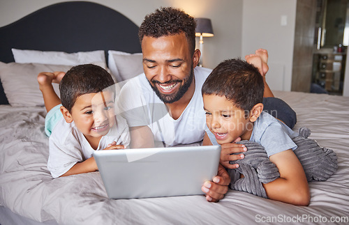 Image of Happy, father and kids watching entertainment shows on digital tablet in the bedroom at home. Technology, man and children relax on bed together to bond and have fun streaming with fast 5g internet.