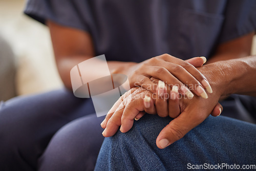 Image of Support, trust and empathy during counseling or therapy with a nurse and senior man in retirement home with healthcare insurance. Hands of caregiver and patient with compassion, help and hospice care