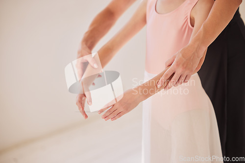 Image of Dance, art and ballet teacher with girl ballerina practicing posture in a creative studio. Child classical dancer training with an instructor for a recital show. Elegant student dancing at a school.