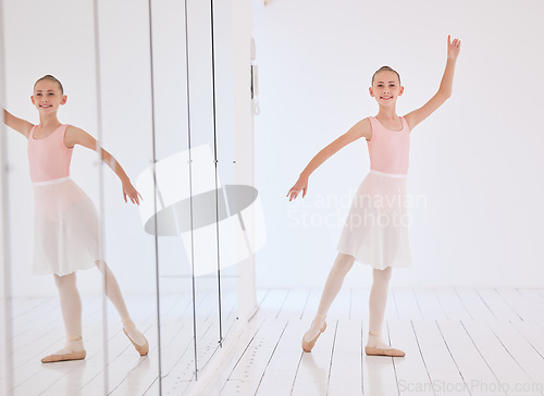 Image of Happy ballet dancer girl stretching in a dance studio with mirror reflection and portrait. Smile face of a learning child dancing in a class in pink princess costume for a performance