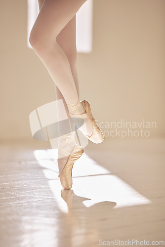 Image of Ballet, dance and balance of a dancer shoes, ballerina and performance artist alone in a studio. Legs and toes for training, practice and rehearsal with technique and skill in artistic dancing sport.