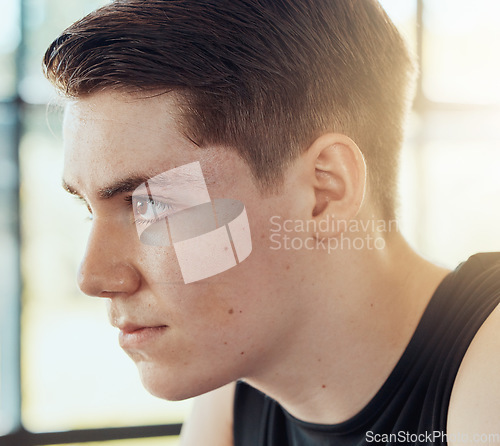 Image of Thinking man face with motivation and focus in a room alone while focused on goal and determined. Headshot of young person with effort, pride and idea or mental vision to be a success in life