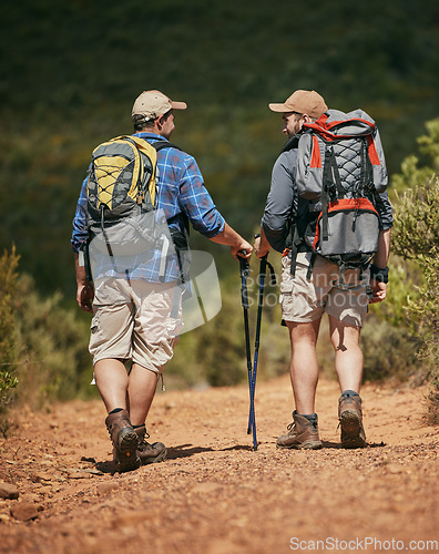 Image of Fitness, nature hiking and exercise of friends on mountain workout in forest park on summer day.Walk adventure, active and fit sport men trekking in green grass trees hike or foot path track