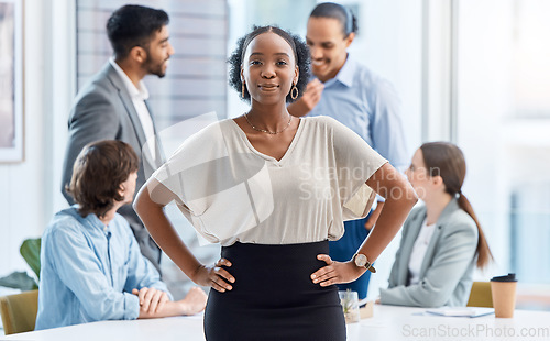 Image of Leadership, motivation and corporate black woman leader in a business meeting with happy team in office. Power female leading discussion of goal or mission, sharing strategy and planning with vision