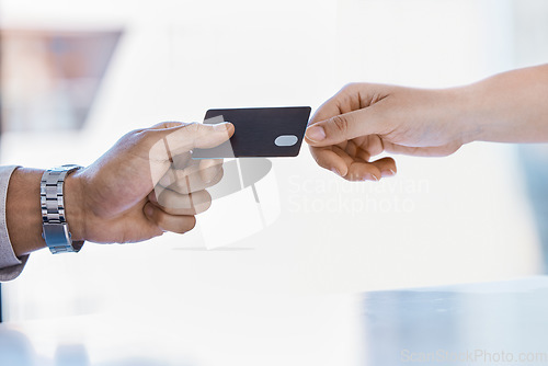Image of Corporate hands exchange credit card to accountant for payment for company tax bills, money loan and accounting fees. Businessman with banking card to invest in financial savings budget investment