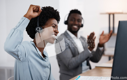 Image of Celebrating, cheering and success with a female call center agent or support staff employee working in service or sales. Helping, assisting and talking to solve problems and provide feedback