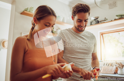 Image of Happy couple cooking fresh vegetables and healthy food in the kitchen together at home for dinner time. In love, romantic and young husband and wife cutting natural organic consumables for their diet