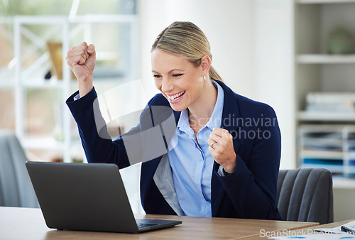 Image of Happy and excited crypto winner celebrating stock market success while reading on laptop, winning and cheering for online bonus in an office. Corporate woman getting good news about investment growth