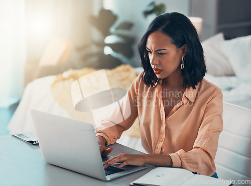 Image of Confused, working and typing business woman having internet problems and thinking on a computer. Remote female online employee alone with a tech problem, web 404 error report or job trouble at home