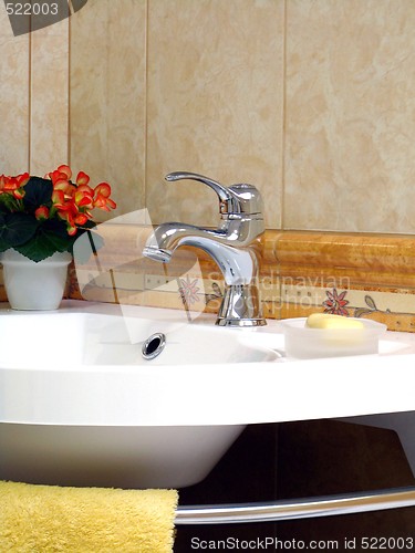 Image of Interior of bathroom - basin and faucet