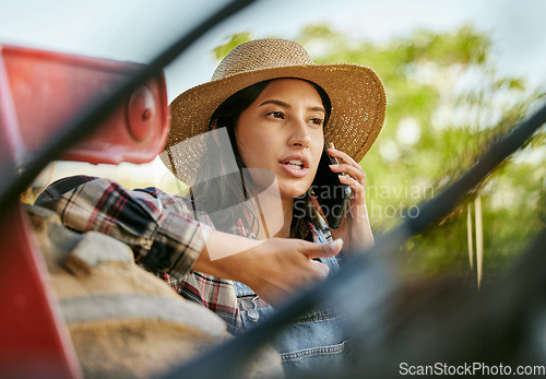 Image of Sustainability farmer, worker and woman on a phone talking and planning a plant growth strategy. Sustainable, eco friendly farm hand on a work call about farming, agriculture and countryside project