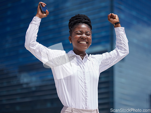 Image of Excited, happy and celebration woman employee with phone for deal, promotion and online sale in a city. Smiling, successful and cheerful freelance entrepreneur cheering after winning the lottery