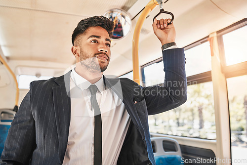 Image of Business man, commuting and bus travel with public transport. Travelling person in formal suit alone in urban transportation. Professional and dedicated worker standing in moving vehicle.