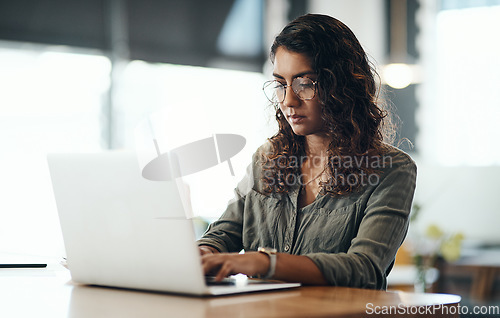 Image of Business owner typing on laptop, checking emails and ordering new stock while sitting at a restaurant. Cafe manager, boss and entrepreneur networking online, updating social media page and website