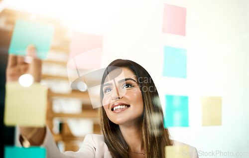 Image of Planning, strategy and creative manager business woman working on idea, solution or project management with post it moodboard design. Happy marketing worker with vision or goal in company development