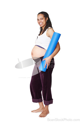 Image of Pregnant, happy and yoga woman in portrait shows pregnancy, healthcare and wellness for her baby. Pilates, fitness and spiritual mother to be with a smile, mat and big stomach in studio for exercise