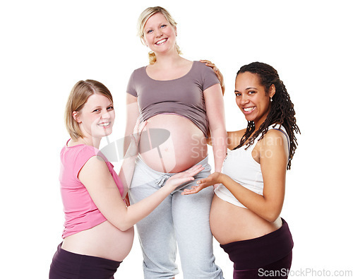 Image of Pregnant, friends and woman with hands on stomach of pregnancy wellness female against a white background. Support, hope and diversity portrait of women showing healthy abdomen of happy mother