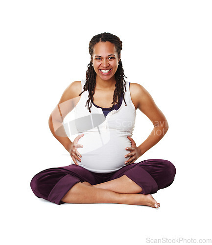 Image of Portrait of a pregnant mother or woman in happy sitting and holding her baby bump isolated on a white background. Black female excited, smile and ready for a newborn child alone with cross legs.