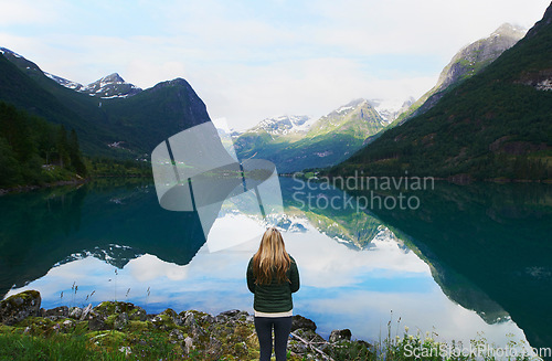 Image of Adventure woman enjoying view of majestic mountain lake explore travel discover beautiful earth