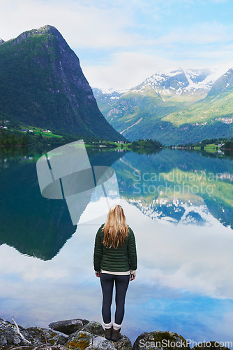 Image of Adventure woman enjoying view of majestic mountain lake explore travel discover beautiful earth