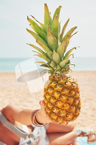 Image of Beautiful happy Woman holding Exotic Pineapple fruit symbol of summer beach vacation healthy organic diet food