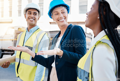 Image of Construction worker, female architect and engineer working as a team on project maintenance on a building site in the city. Teamwork, collaboration and success in the architecture and design industry
