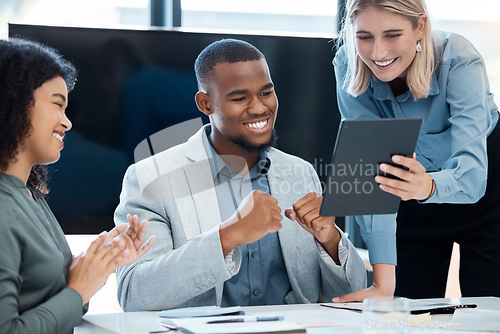 Image of Team celebration for email news on a tablet in a corporate office with happy smile. Black employee read message of promotion online with manager and boss while celebrating together and clapping