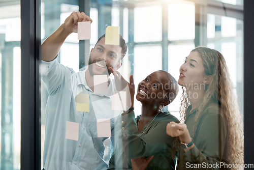 Image of Diversity, collaboration and team in a business brainstorming strategy for planning and sticky notes. Creative people sharing ideas, plan and schedule work tasks in teamwork and delegation at office.