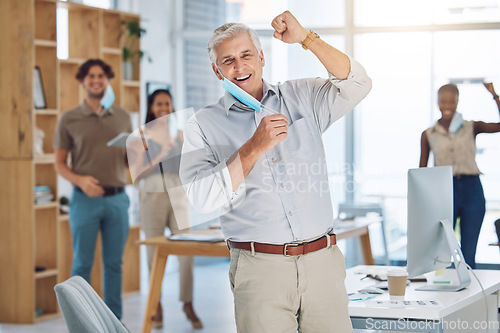 Image of Covid, mask and celebration with business people cheering the end of lockdown, restrictions and regulations after the corona virus pandemic. Getting back to work, freedom and success in the office