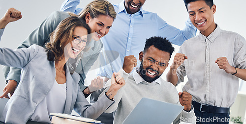 Image of Celebration, winning and fist pump business people with laptop reading email report for finance, profit or success. Victory, bonus or yes hands sign of diversity team with good trading or crypto news