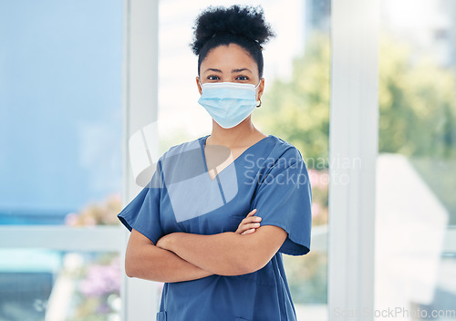 Image of Nurse, healthcare black woman with a covid face mask in confident portrait. Innovation, leadership and proud medical nursing professional, surgeon or health employee with vision for success in career