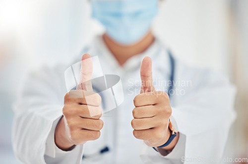 Image of Thumbs up doctor hand sign for covid surgery success, support and yes in a hospital. Medical and healthcare worker showing thank you, agreement or goal completion hands gesture in a health clinic