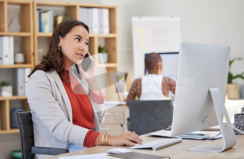 Image of Corporate woman on phone call and computer typing, working on company management and business email. Mexico girl and online technology communication manager on 5g digital mobile smartphone at office