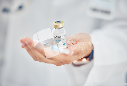 Image of Covid vaccine vial, doctor hands and medicine injection for healthcare cure, wellness safety and antiviral booster shot in hospital clinic. Closeup of corona virus medical treatment immunity support