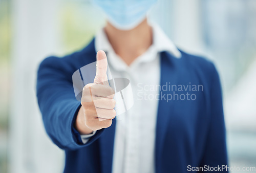 Image of Covid, face mask and thumbs up business person in agreement with social distance proposal policy. Health safety regulation support and good news for corporate company virus protection at work.