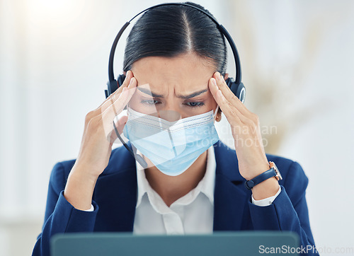 Image of Burnout, headache and pain call center agent working on laptop, headset and medical face mask. Tired, stress and frustrated customer service or contact us woman working on computer with 404 error
