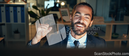 Image of Night business man fist celebrate for success, winning and bonus achievement in dark startup agency. Happy, lucky and excited sales cheering for good news deal, trading motivation and awesome victory