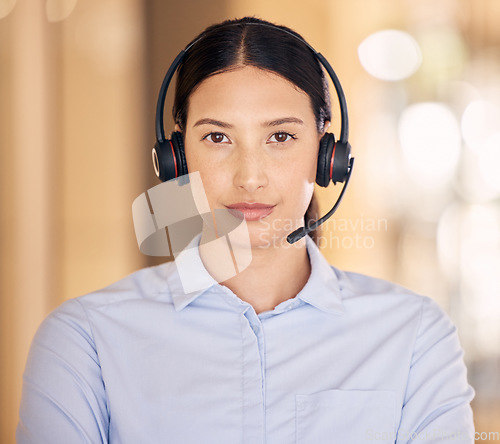 Image of Telemarketing, contact us and customer service support agent ready to provide a good online service. Portrait of a serious sales consultant working at a call center. Tough agent looking ambitious