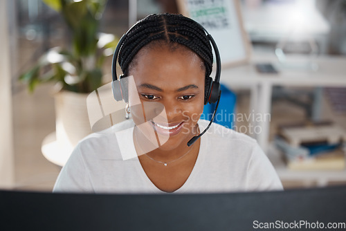 Image of Customer service agent, worker and employee working in telemarketing, helping people online with advice and consulting on computer. Face of a happy African call center consultant giving support