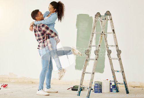 Image of Love couple smile painting house or home interior with paint and ladder for DIY room project and maintenance. African creative and painter black people happy working on apartment wall design together