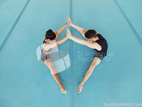 Image of Dance or gymnastics fitness stretching couple, exercise and workout for dancing or gymnastics. Sport, health and flexibility training for a creative sports performance or ballet competition at a gym